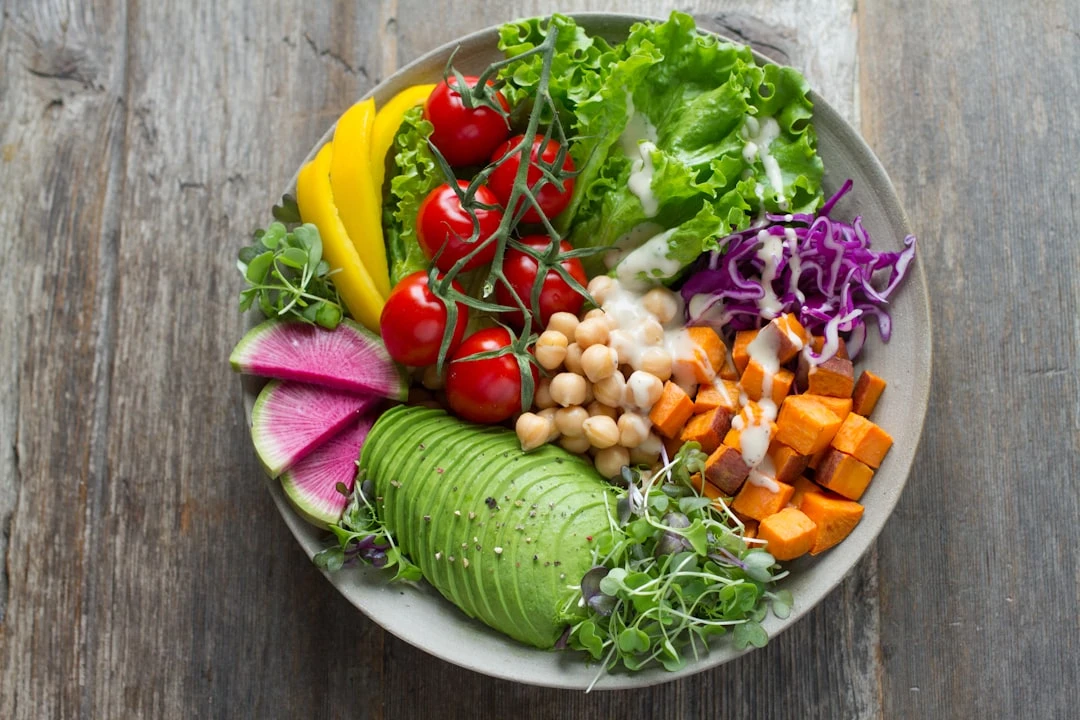 A fresh and colorful salad in a bowl.